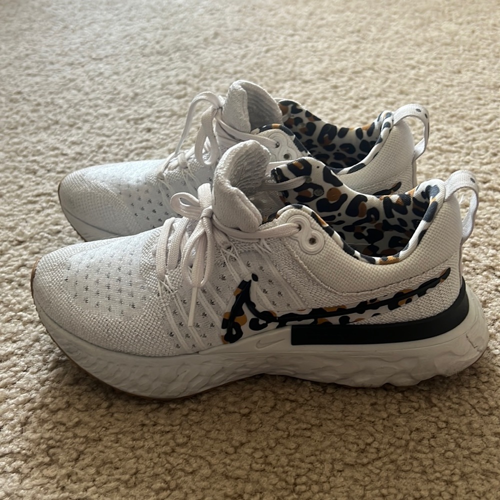 Nike React Infinity Flyknit- size 6.5, white with leopard Nike sign